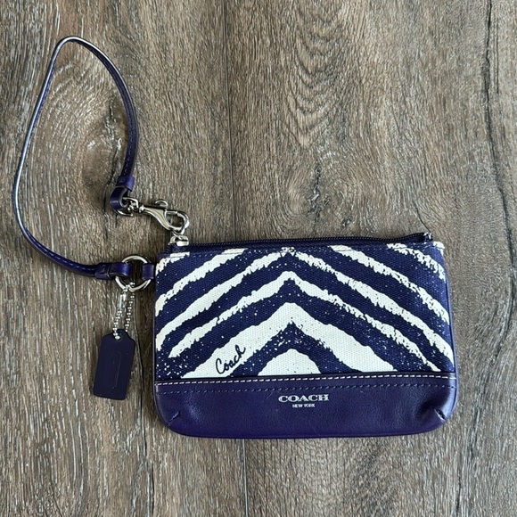 Coach Handbags - Coach Zebra Wristlet. Excellent, like new condition!